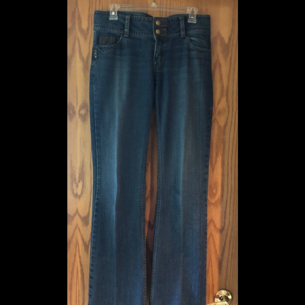 CAbi Flare Jeans Style 54077, size 4 Tall Leather accent Flap Pockets